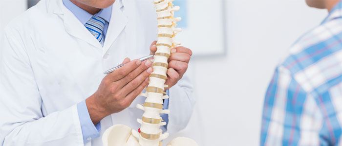 chiropractor explaining disc pain to a patient