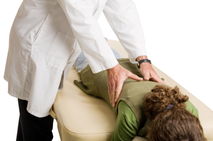 Woman getting treated for low back pain in Fort Wayne